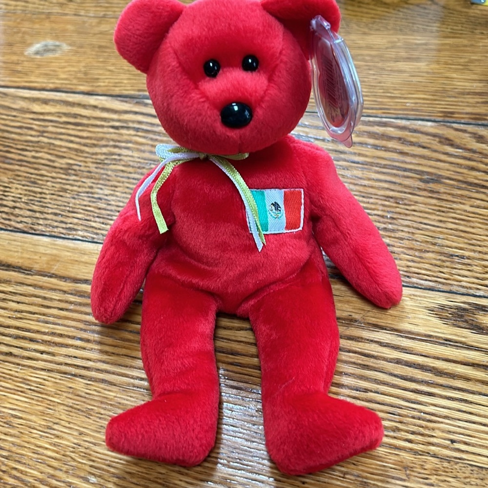 Ty beanie Osito red bear.  Born February 5, 1999.  Great condition. Tag attached